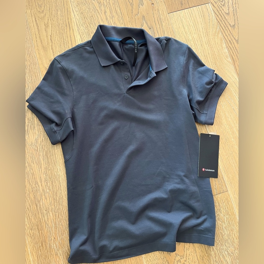NWT Lululemon men’s polo shirt sz small.